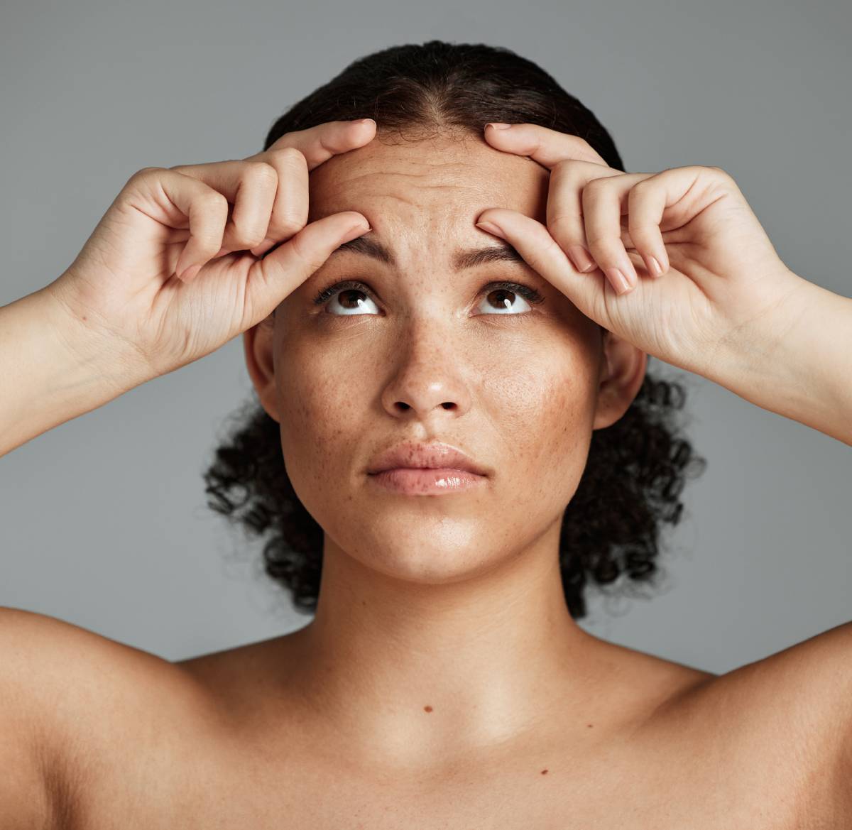 Woman wondering if brow lift will affect her forehead muscles.